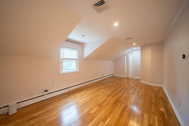 5 Forest Rd, Valley Stream, NY 11581 - bonus room with lofted ceiling, light wood-style flooring, baseboards, baseboard heating, and recessed lighting
