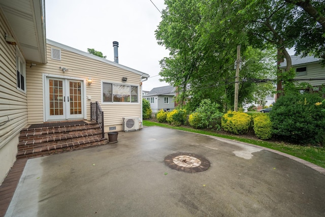 5 Forest Rd, Valley Stream, NY 11581 - view of patio / terrace featuring french doors and a cooling unit