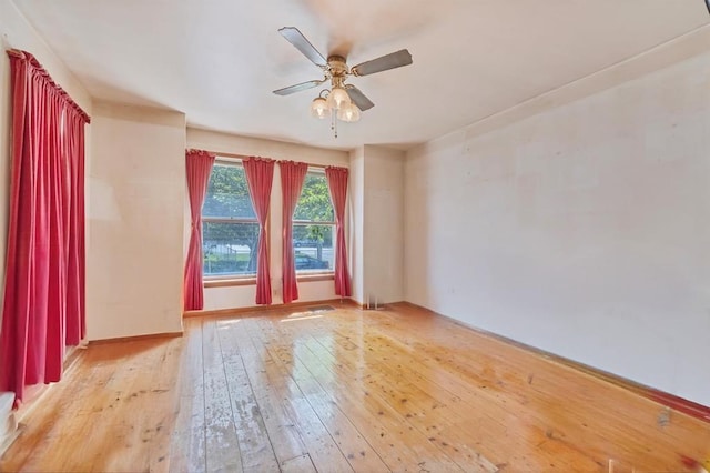 163 Cannon St, Poughkeepsie, NY 12601 - empty room with ceiling fan, light wood-style floors, and baseboards