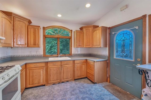 163 Cannon St, Poughkeepsie, NY 12601 - kitchen featuring a sink, gas range gas stove, tasteful backsplash, vaulted ceiling, and recessed lighting