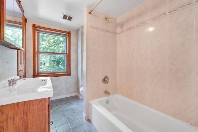 163 Cannon St, Poughkeepsie, NY 12601 - bathroom with healthy amount of natural light, toilet, vanity, and tile patterned flooring
