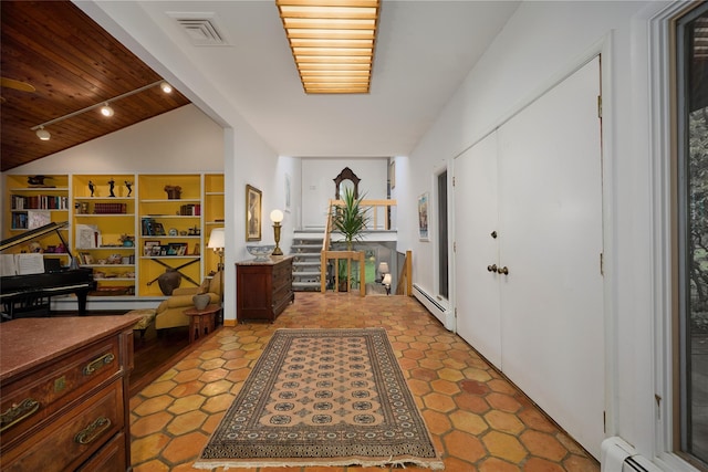 31 Greenlawn Rd, Katonah, NY 10536 - entrance foyer with a baseboard heating unit, lofted ceiling, and wood ceiling