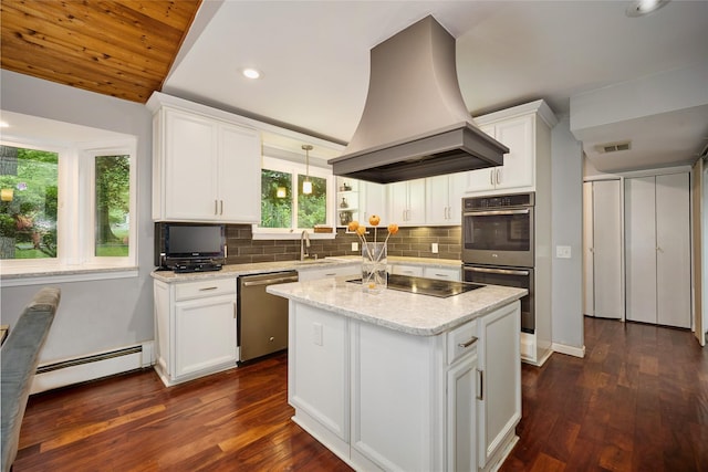 31 Greenlawn Rd, Katonah, NY 10536 - kitchen featuring appliances with stainless steel finishes, custom range hood, a baseboard heating unit, dark wood-style floors, and recessed lighting