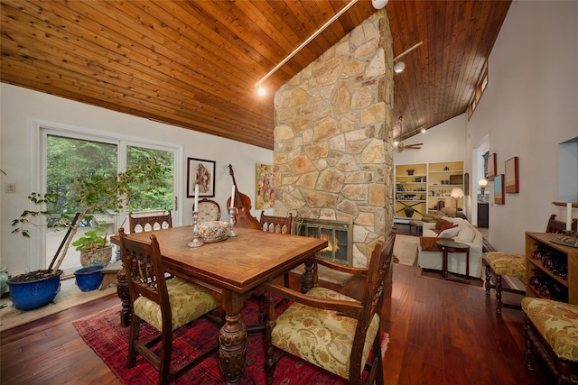 31 Greenlawn Rd, Katonah, NY 10536 - dining area with wooden ceiling, hardwood / wood-style flooring, high vaulted ceiling, and a stone fireplace