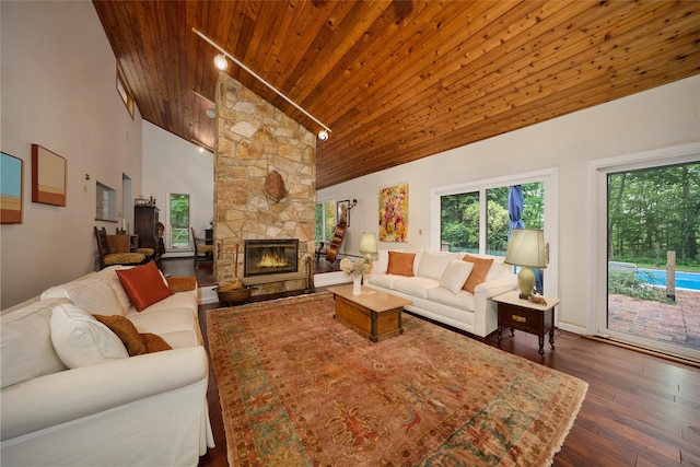 31 Greenlawn Rd, Katonah, NY 10536 - living area with wooden ceiling, high vaulted ceiling, dark wood-style floors, and a fireplace