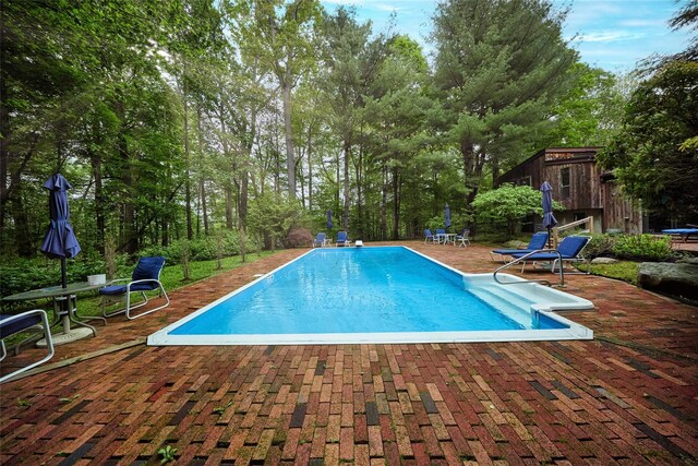 31 Greenlawn Rd, Katonah, NY 10536 - outdoor pool featuring a patio