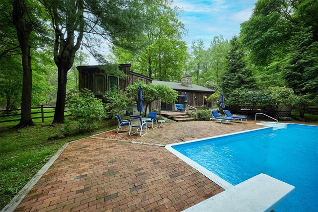 31 Greenlawn Rd, Katonah, NY 10536 - swimming pool with a patio area