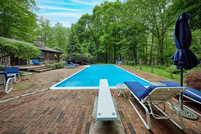 31 Greenlawn Rd, Katonah, NY 10536 - view of pool featuring a diving board and a patio