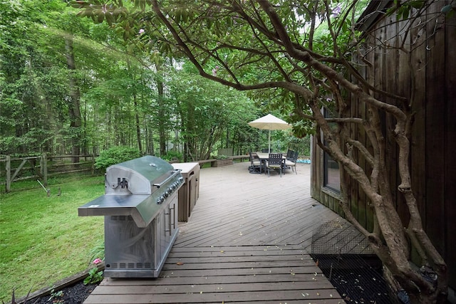 31 Greenlawn Rd, Katonah, NY 10536 - wooden deck featuring outdoor dining space and area for grilling