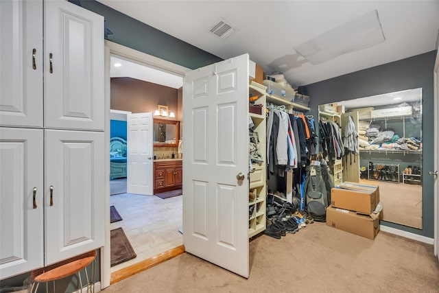 1623 Washington Ave, Bohemia, NY 11716 - walk in closet with light carpet