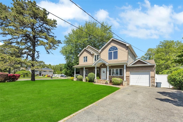 1623 Washington Ave, Bohemia, NY 11716 - traditional-style home with asphalt driveway, a garage, and stone siding