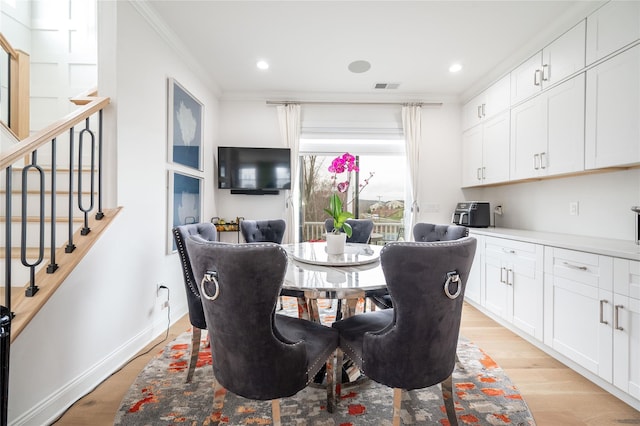 5 Brentwood Cir, Danbury, CT 06810 - dining space featuring crown molding, stairs, light wood-type flooring, recessed lighting, and baseboards