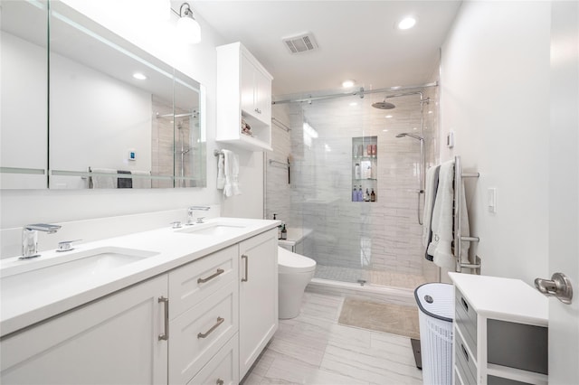 5 Brentwood Cir, Danbury, CT 06810 - full bathroom with toilet, double vanity, a shower stall, recessed lighting, and marble finish floors