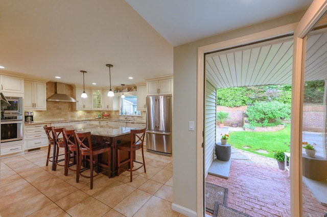 2 Caryl Pl, Kings Park, NY 11754 - dining space featuring light tile patterned floors and recessed lighting