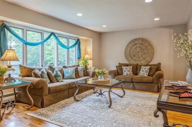 2 Caryl Pl, Kings Park, NY 11754 - living area featuring hardwood / wood-style floors, recessed lighting, and a baseboard radiator