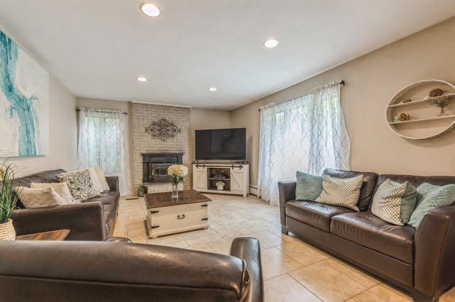 2 Caryl Pl, Kings Park, NY 11754 - living area with light tile patterned flooring, recessed lighting, and a fireplace
