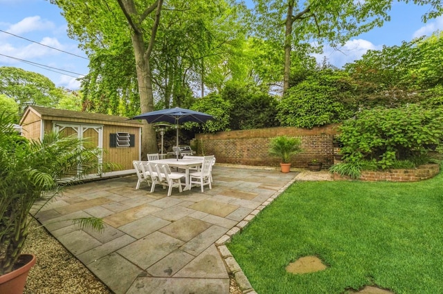 2 Caryl Pl, Kings Park, NY 11754 - view of patio / terrace with an outbuilding and outdoor dining space