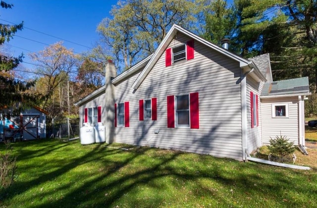 2611 State Route 55, Bethel, NY 12720 - view of property exterior with a yard and a chimney