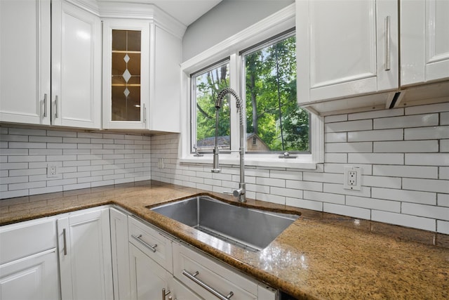1 Renee Gate St, Cortlandt Manor, NY 10567 - kitchen featuring a sink, white cabinetry, glass insert cabinets, backsplash, and stone counters