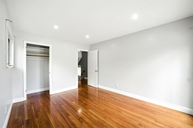1 Renee Gate St, Cortlandt Manor, NY 10567 - unfurnished bedroom with wood finished floors, baseboards, a closet, and recessed lighting