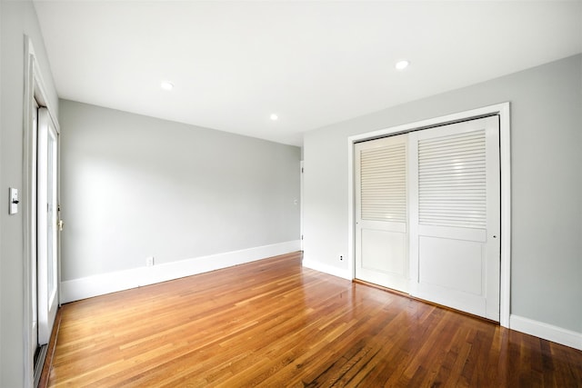 1 Renee Gate St, Cortlandt Manor, NY 10567 - unfurnished bedroom featuring light wood finished floors, a closet, baseboards, and recessed lighting