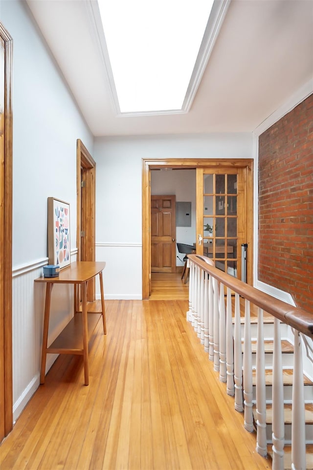 175 Liberty St, Newburgh, NY 12550 - hallway with light wood-style flooring and a skylight