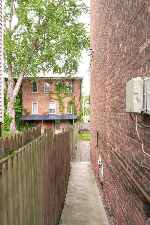 175 Liberty St, Newburgh, NY 12550 - view of property exterior featuring brick siding