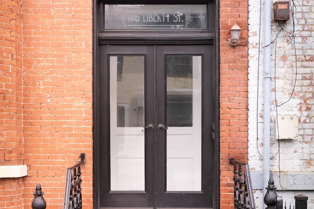 175 Liberty St, Newburgh, NY 12550 - doorway to property featuring french doors
