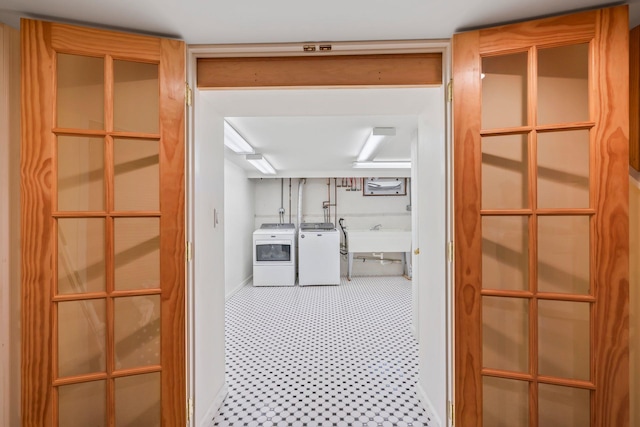 74 Buckingham Rd, West Hempstead, NY 11552 - hall featuring washer and dryer and a sink