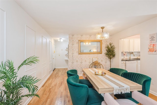 2453 Union Blvd Unit 11A, Islip, NY 11751 - dining room with light wood-style flooring and baseboards