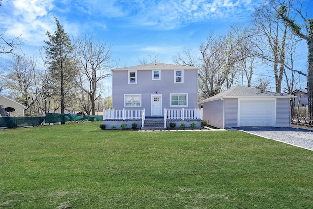 2939 N Wading River Rd, Wading River, NY 11792 - colonial house with an outdoor structure, a porch, a garage, and driveway