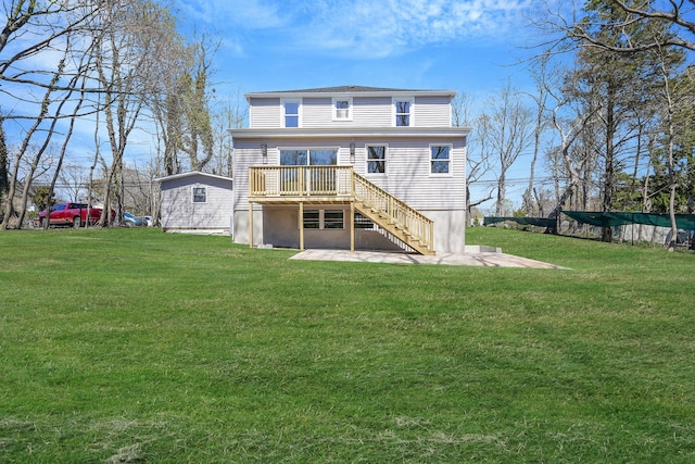 2939 N Wading River Rd, Wading River, NY 11792 - back of house with stairway, a deck, a lawn, and a patio area
