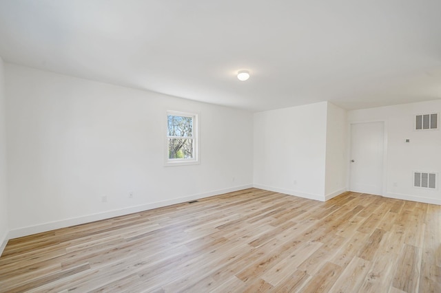 2939 N Wading River Rd, Wading River, NY 11792 - spare room featuring light wood-type flooring and baseboards