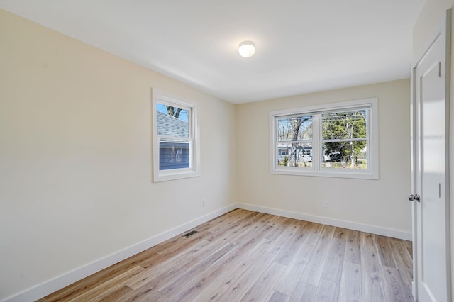 2939 N Wading River Rd, Wading River, NY 11792 - spare room featuring healthy amount of natural light, light wood finished floors, and baseboards