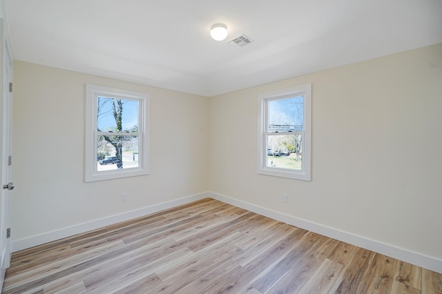 2939 N Wading River Rd, Wading River, NY 11792 - spare room with light wood-style floors and baseboards