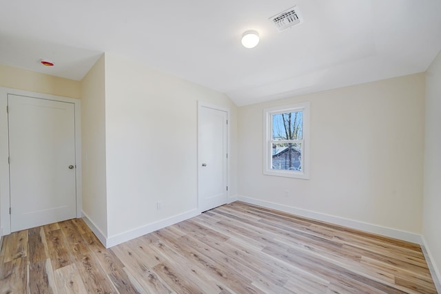 2939 N Wading River Rd, Wading River, NY 11792 - unfurnished room featuring light wood-style flooring and baseboards
