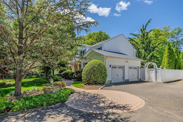 4 Pak Ct, East Setauket, NY 11733 - view of property exterior with driveway and an attached garage