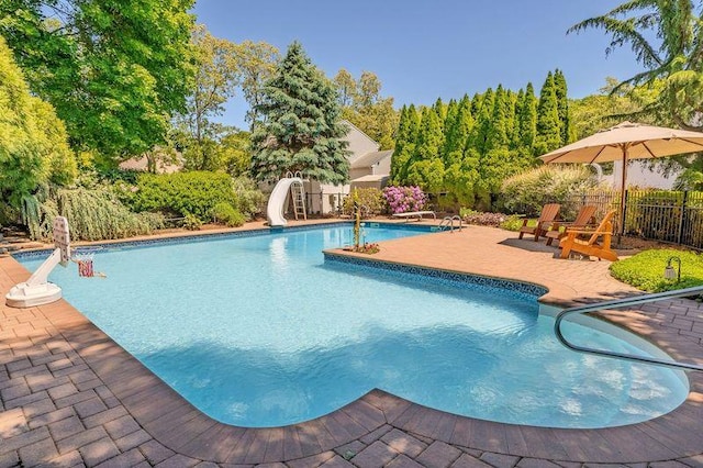 4 Pak Ct, East Setauket, NY 11733 - view of pool featuring a water slide and a patio