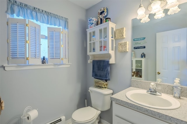 4 Pak Ct, East Setauket, NY 11733 - half bathroom featuring toilet, vanity, a chandelier, and a baseboard radiator