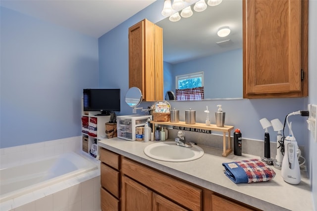 4 Pak Ct, East Setauket, NY 11733 - bathroom with a garden tub and vanity
