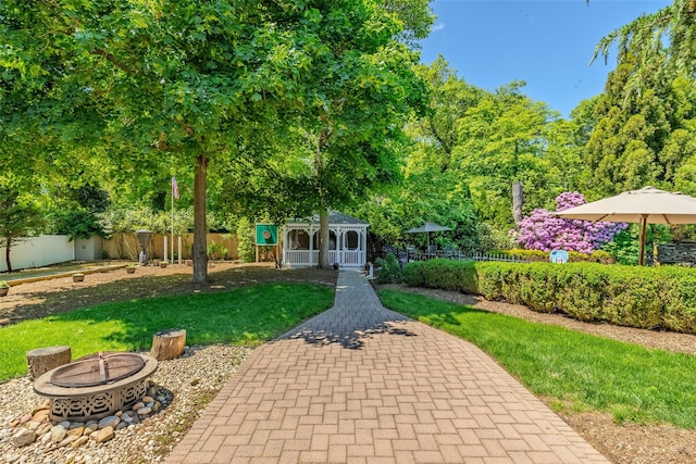 4 Pak Ct, East Setauket, NY 11733 - view of front facade with a fire pit