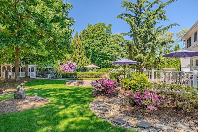 4 Pak Ct, East Setauket, NY 11733 - view of green lawn with a fire pit