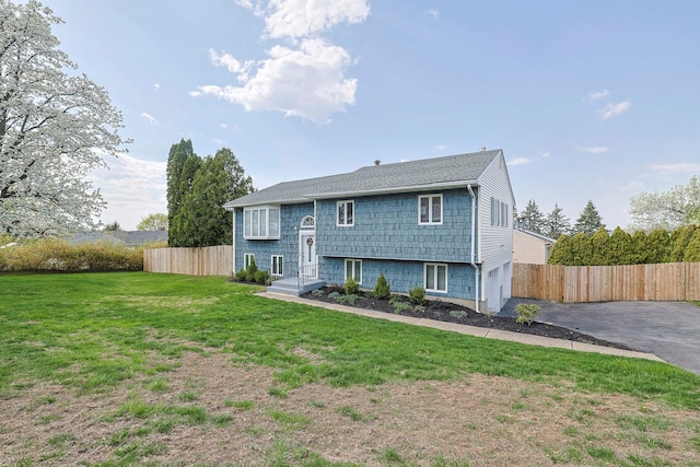 8 Country Ln, Warwick, NY 10990 - raised ranch with asphalt driveway, an attached garage, and roof with shingles