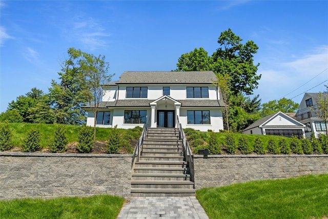 2 Henry St, Great Neck, NY 11023 - view of front of house featuring stucco siding