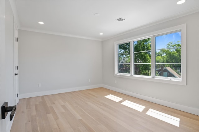 2 Henry St, Great Neck, NY 11023 - empty room with light wood-type flooring, baseboards, ornamental molding, and recessed lighting