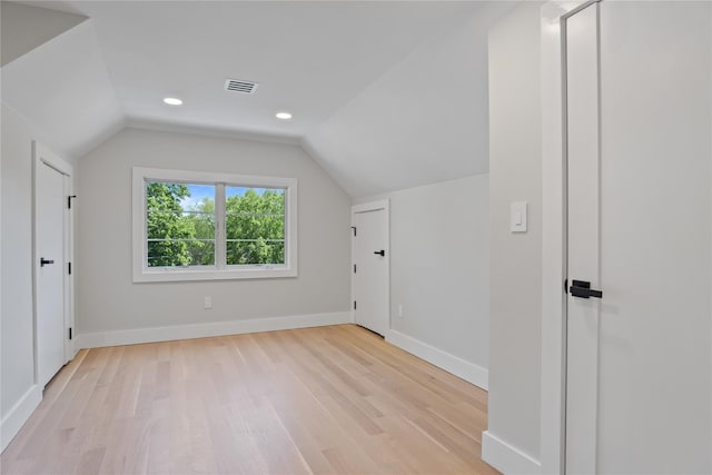 2 Henry St, Great Neck, NY 11023 - bonus room with light wood-style flooring, lofted ceiling, baseboards, and recessed lighting
