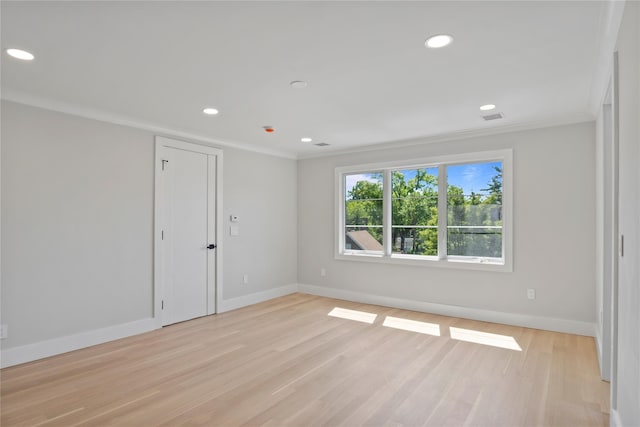 2 Henry St, Great Neck, NY 11023 - spare room featuring ornamental molding, baseboards, light wood-style flooring, and recessed lighting
