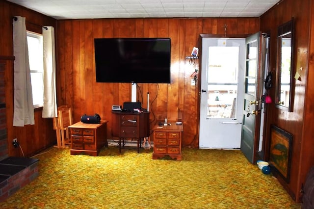 465 18th St, West Babylon, NY 11704 - carpeted living room with wooden walls and an office area