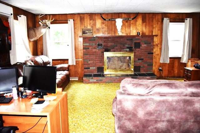 465 18th St, West Babylon, NY 11704 - living area with wooden walls, a fireplace, a wall unit AC, a desk, and carpet