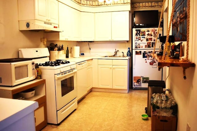 465 18th St, West Babylon, NY 11704 - kitchen with white appliances, under cabinet range hood, a sink, and light countertops